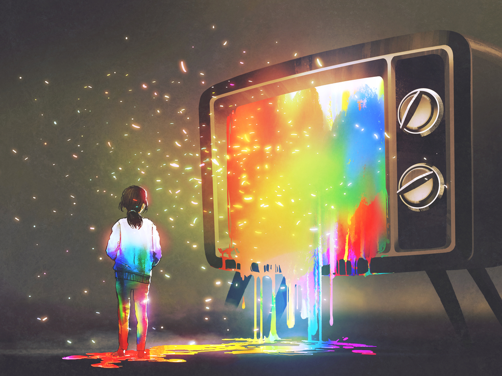 Person standing in front of colorful television